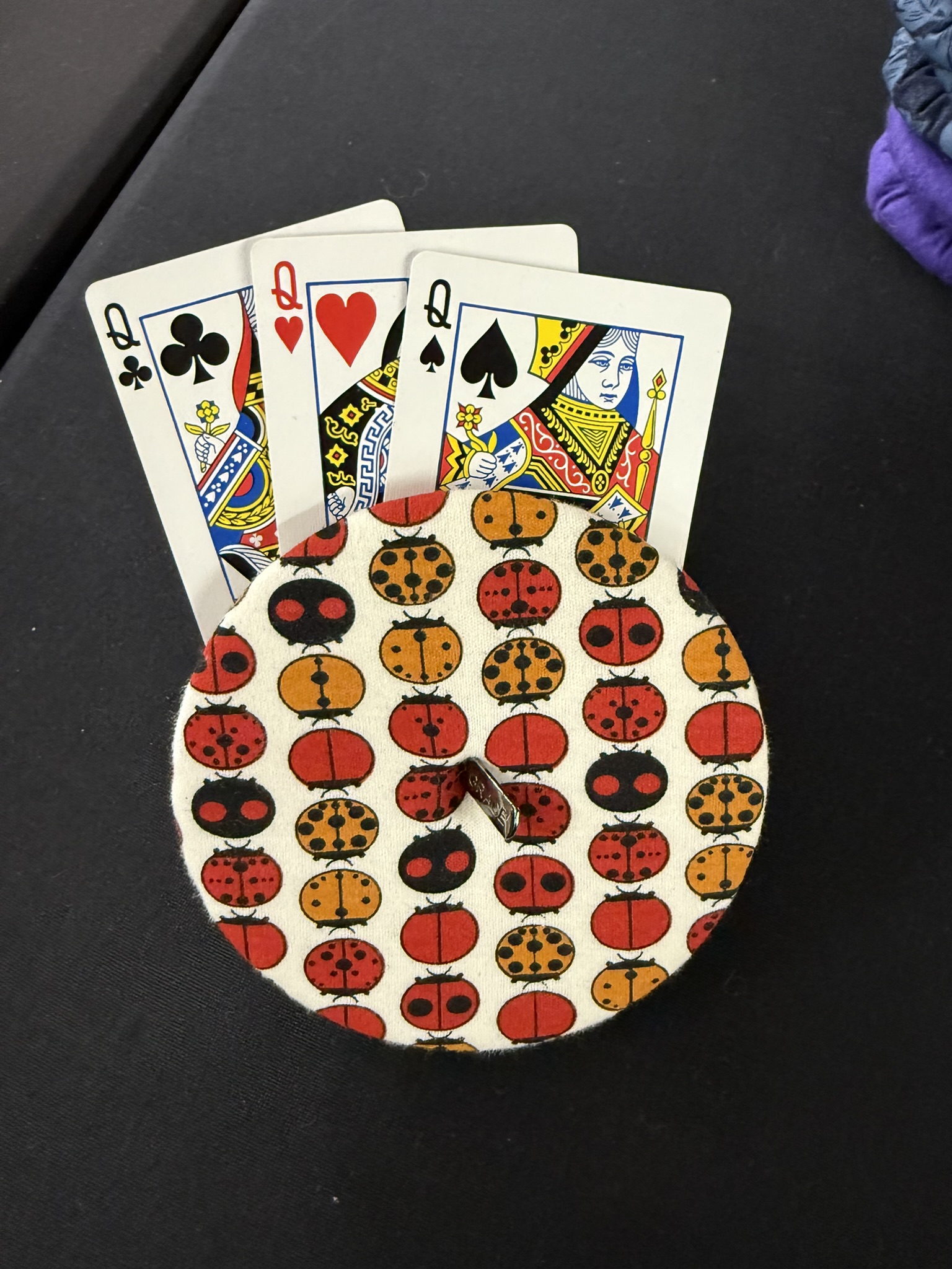 ladybug playing cards holder with a grace charm