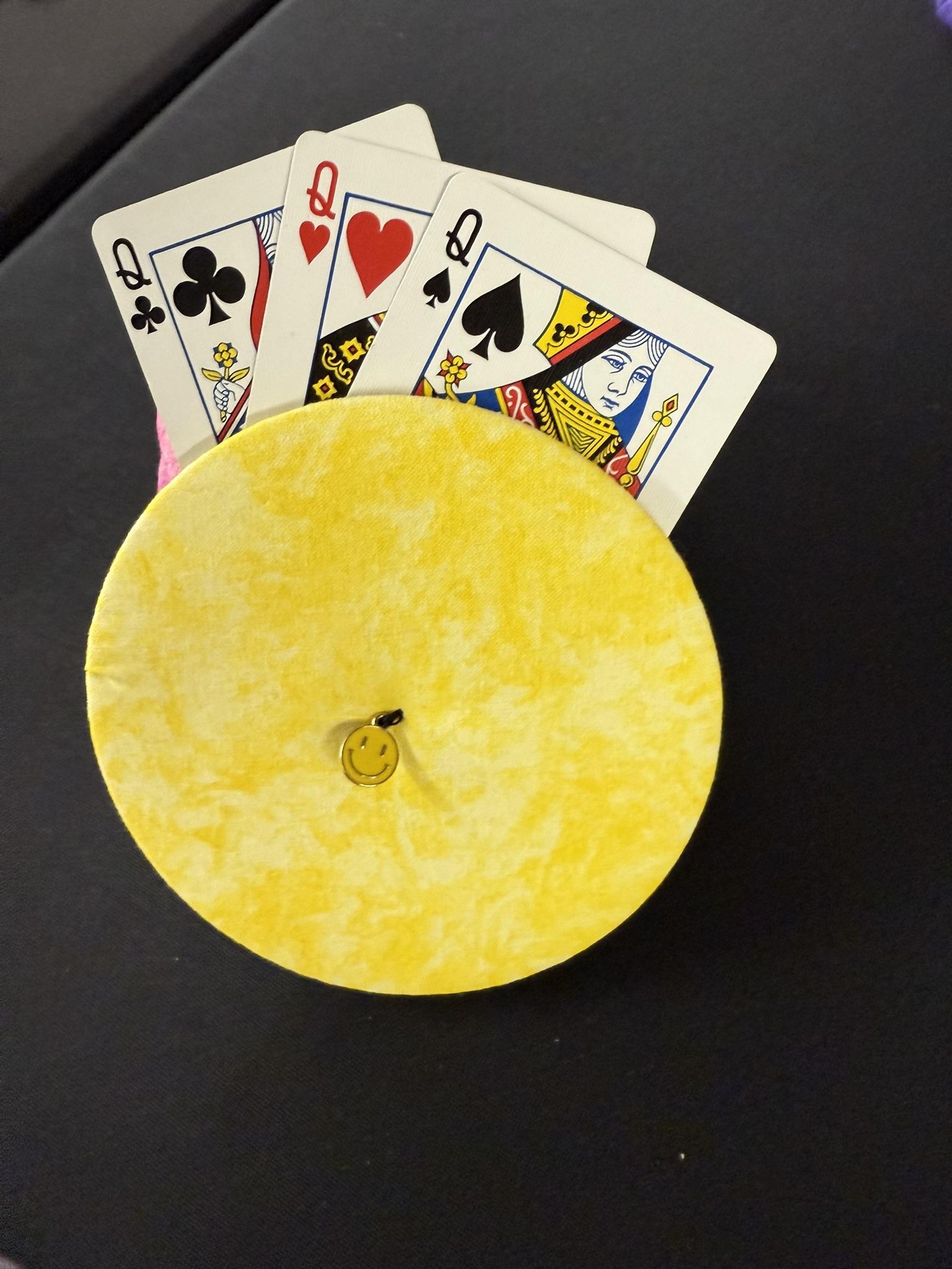 yellow playing cards holder with smiley face charm