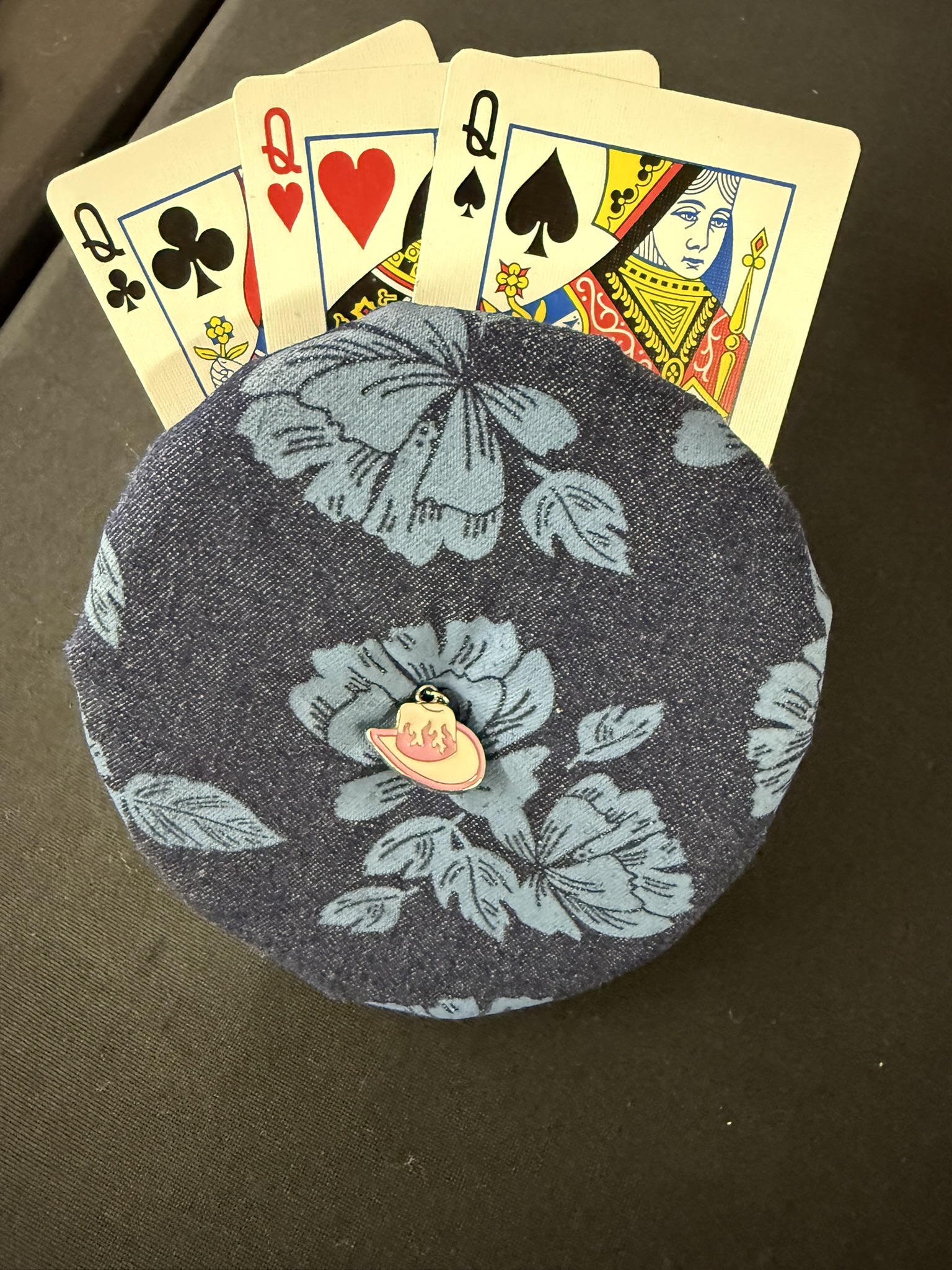 blue floral playing cards holder with pink and white cowboy hat charm
